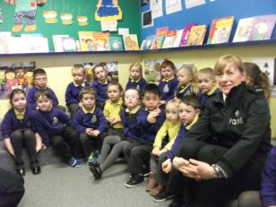 Constable Leslie talks to the Nursery Children