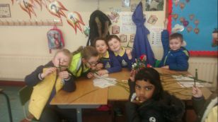 Making St Brigids Crosses with Mrs McMenamins P3 Class