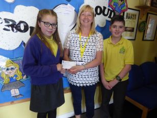 Presentation to Young Enterprise following Holy Trinity KS2 Bake Sale